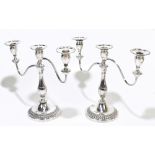 VINERS; a pair of silver plated candelabra with cast rims, height 28cm, (2).Additional