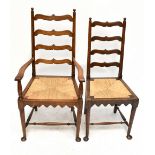 A set of six early 20th century wavy ladder back rush seated dining chairs raised on turned front