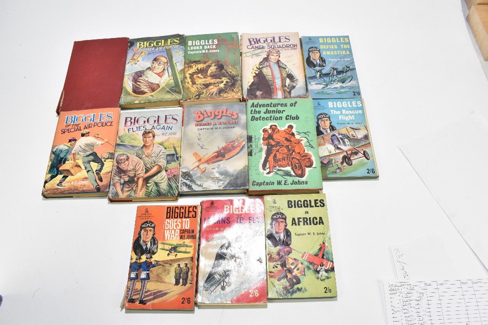 CAPT W E JOHNS; a collection of Biggles books, to include, BIGGLES BURIES A HATCHET, blue cloth with - Image 2 of 2