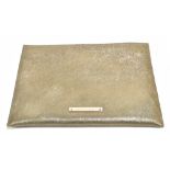AMANDA WAKELEY; an unused metallic textured grained leather clutch bag with rose gold tone maker's