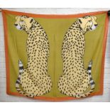 HERMÈS; a very large 100% cotton Les Leopards scarf, mainly orange/brown with black and cream