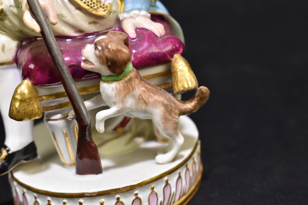 MEISSEN; an early 20th century figure of a seated huntsman with hound by his feet, painted marks and - Image 6 of 8