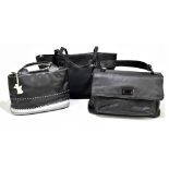 CALVIN KLEIN; a black nylon cloth and black leather tote bag with black leather jewel top handles