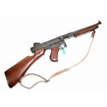 A deactivated Thompson .45 ACP sub machine gun, No 305913, no activation certificate number 164567