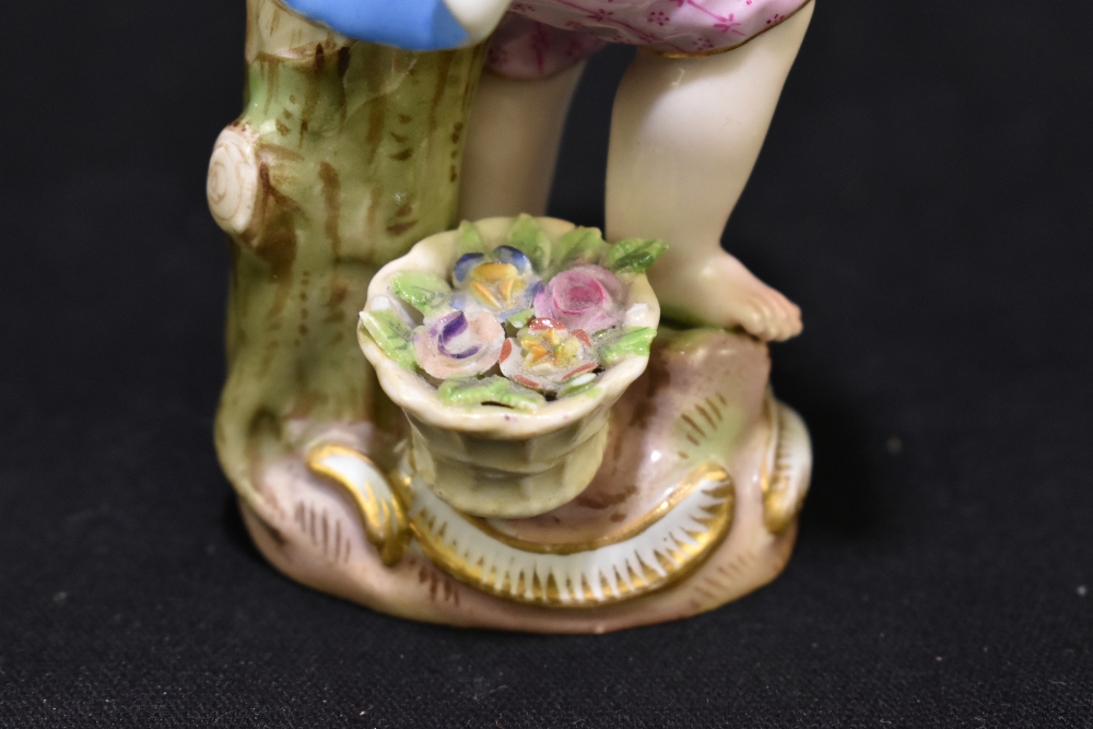 MEISSEN; a mid 19th century figure of a young child holding a garland of flowers, painted marks to - Image 8 of 9