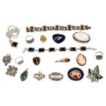 A group of costume jewellery including an enamel decorated base metal bracelet, various brooches,