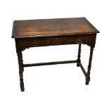 WARING AND GILLOWS; an oak single drawer side table raised on wrythen turned and block legs, width