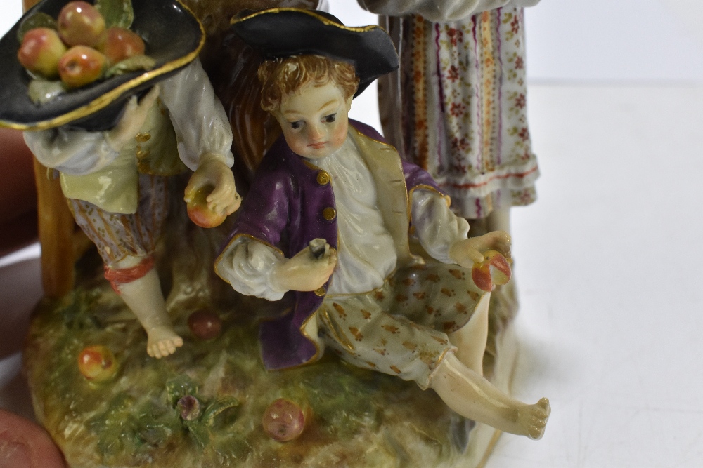 MEISSEN; an early 20th century figure group of a figure picking apples in an apple tree with three - Image 13 of 13