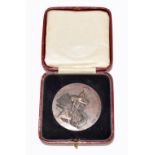 CHARLES HORNER; a British Empire Exhibition 1925 cased medallion awarded to Horner, diameter 50mm.