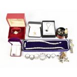 A collection of costume jewellery and watches.