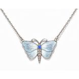 CHARLES HORNER; a sterling silver and blue enamel decorated butterfly necklace with oval dark blue
