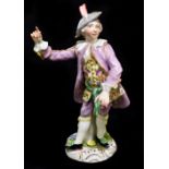 MEISSEN; an early 19th century figure of a young gentleman wearing floral waistcoat and with feather