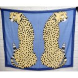HERMÈS; a very large 100% cotton Les Leopards scarf, mainly blue with black and cream leopards,