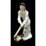 MEISSEN; an 18th century figure of a woodcutter, faint mark to base, height 14cm.Additional