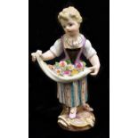 MEISSEN; a mid 19th century figure of a child holding flowers in her apron, painted marks to base