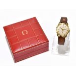 OMEGA; a gentleman's gold plated automatic wristwatch, the silvered dial set with batons and