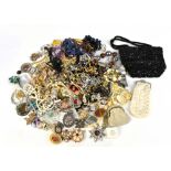 A small quantity of assorted costume jewellery including various brooches, necklaces, a bead work