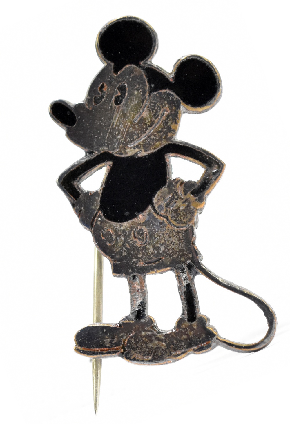 CHARLES HORNER; a white metal and black enamelled brooch/badge in the form of Mickey Mouse with