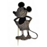 CHARLES HORNER; a white metal and black enamelled brooch/badge in the form of Mickey Mouse with