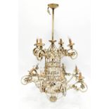 A large cream painted contemporary metal two tier light fitting with scrolled branches, length