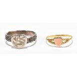 CHARLES HORNER; a George V hallmarked 9ct yellow gold ring with heart shaped motif within pierced