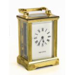 MAPPIN & WEBB; a lacquered brass carriage timepiece with Roman numeral dial, height 11.5cm.