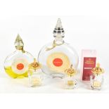 GUERLAIN; a pair of large 1950s Guerlain glass display perfume bottles, together with a graduated