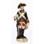 MEISSEN; an early 20th century figure of a soldier, painted marks to base, twice scratched through