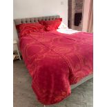 HERMÈS; a silk and cotton red jacquard bedding set comprising a large duvet cover, 200 x 245cm and a