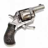 A late 19th century .30 calibre pocket pistol with scroll decoration to the grip, not holding on the