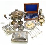 A group of assorted silver plate including a large twin handled lidded tureen raised on cast feet,