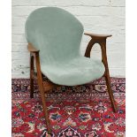 A 1970s Dutch teak chair with green upholstered back and seat on tapered legs.