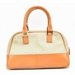 CELINE; a tan calfskin leather and maker's monogrammed suede 'bowling bag' with jewel top rolled