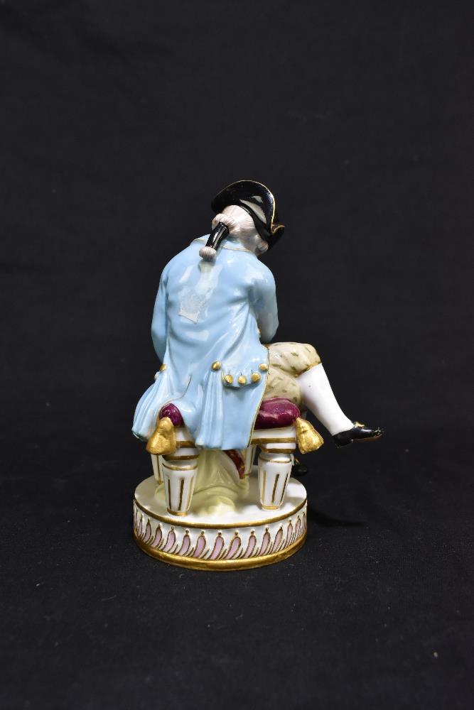 MEISSEN; an early 20th century figure of a seated huntsman with hound by his feet, painted marks and - Image 3 of 8