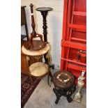 A mid 20th century gilt brass and onyx two tier occasional table, height 77cm, also a similar onyx