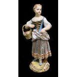 MEISSEN; a late 19th century figure of a young woman holding a basket of flowers, painted marks to