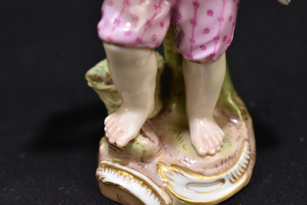 MEISSEN; a mid 19th century figure of a young child holding a garland of flowers, painted marks to - Image 7 of 9