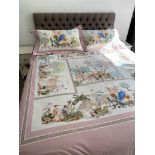 HERMÈS; a 100% cotton grey, pink and pastel coloured bedding set, the duvet cover 200 x 245cm,