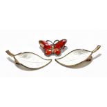 DAVID ANDERSEN; a pair of sterling silver and white enamelled leaf decorated ear clips and a small