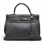 HERMÈS; a Kelly 35 Sellier Epsom leather black handbag with palladium hardware, date stamped 'M',