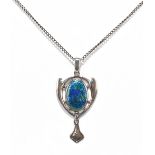 CHARLES HORNER; a George V hallmarked silver pendant with blue/green enamelled decoration and