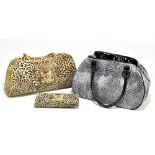 BUTLER & WILSON; an unused gold faux leather and textured cloth leopard print handbag with gold tone