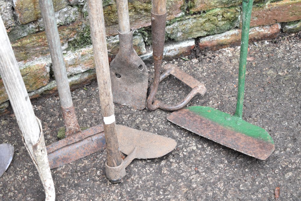 A collection of twelve vintage garden hoes of varying styles. PROVENANCE: The Raymond Rush - Image 4 of 4