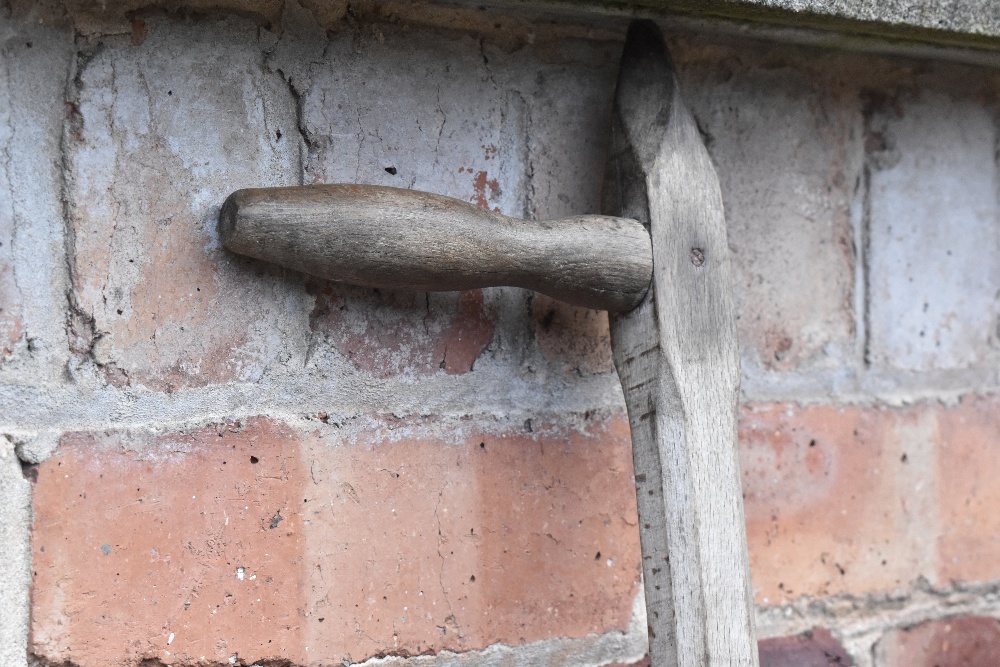 A vintage red painted wood and iron hay rake, two scythes, two potato forks, a fork and a fork head. - Image 5 of 8