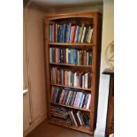 A modern pine bookcase, with five adjustable shelves, height 199cm, width 88cm. PROVENANCE: The