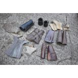 Eight tan leather gaiters, and two black leather wrist straps, seven cloth and canvas examples,