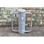 A modern galvanised fence post twin handled mallet. PROVENANCE: The Raymond Rush Collection. Mr Rush
