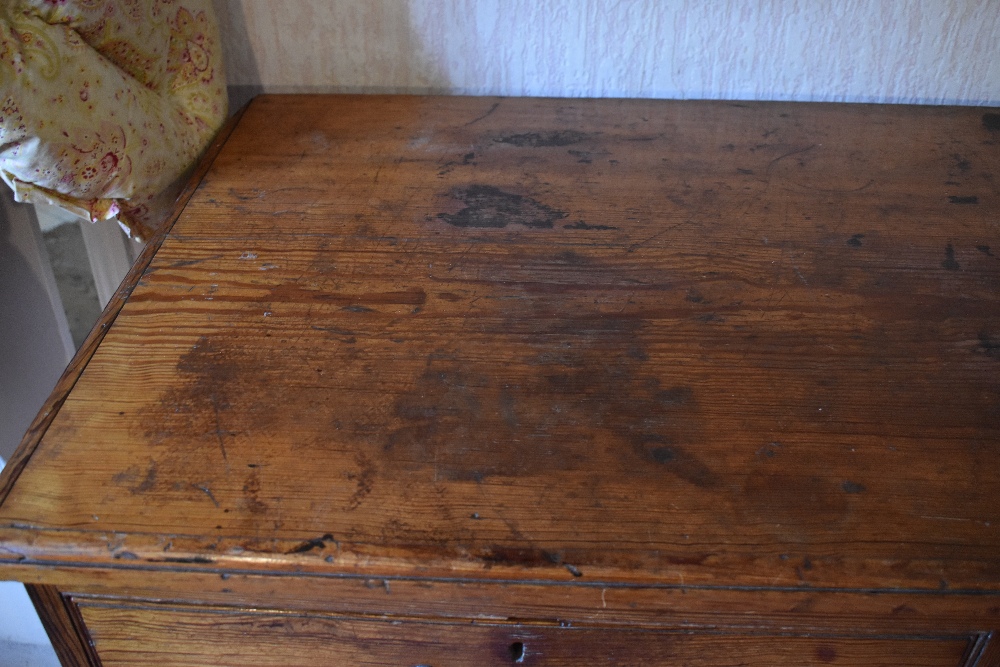 A late Victorian pitch pine chest of two short and three long drawers, on carved block feet, - Image 4 of 8