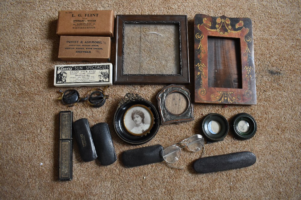 A small selection of vintage spectacles, some in original boxes which are named, an Art Nouveau