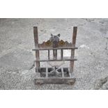 A vintage wood butter/milk churn cart, with a rise and fall paddle section, on rectangular base